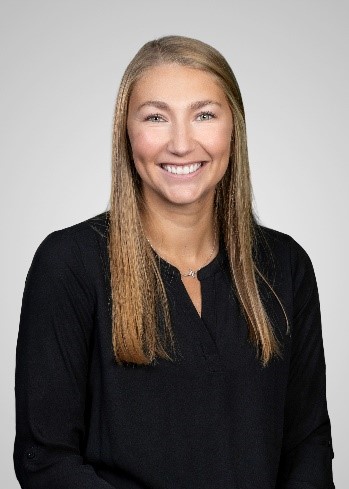 A young woman smiling