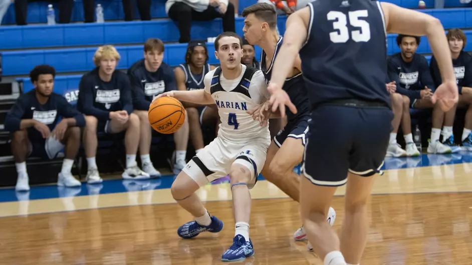 Men playing college basketball