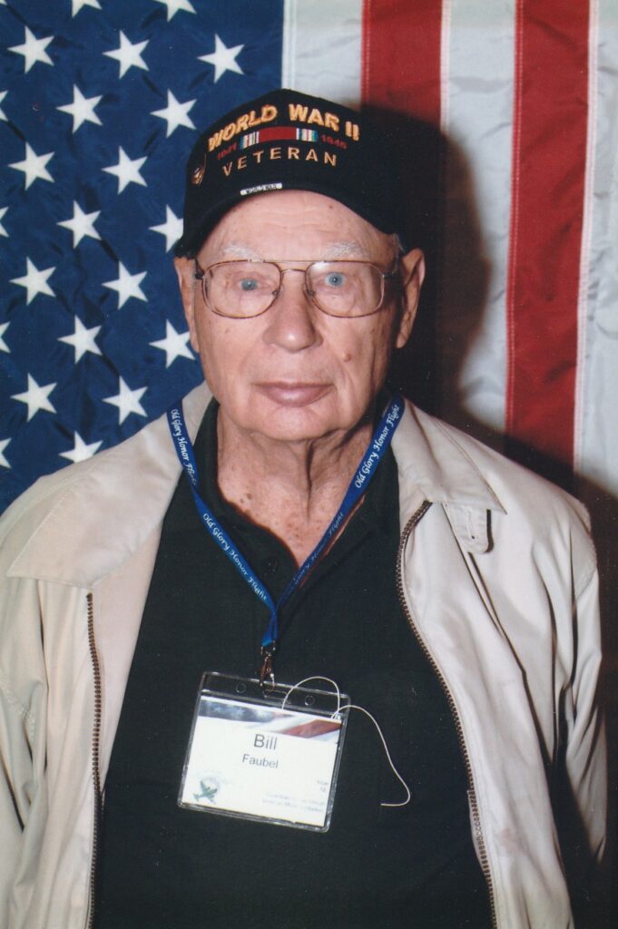 An elderly vet in a hat
