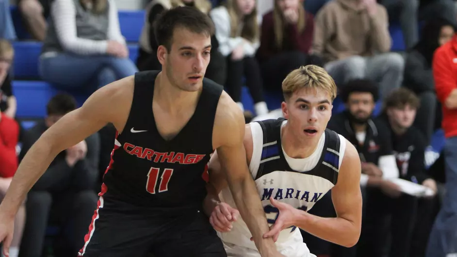 Men playing college basketball