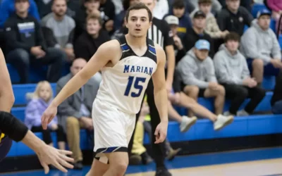 Marian men’s basketball uses dominant first half to down Sabercats