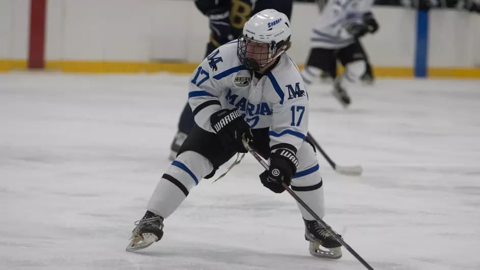 A man playing college hockey
