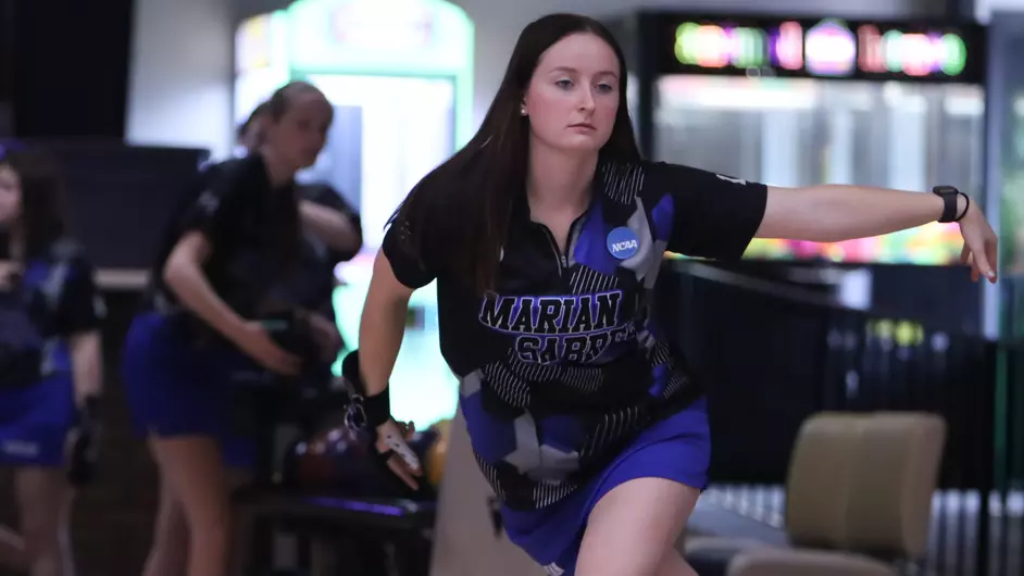 A woman bowling for her college