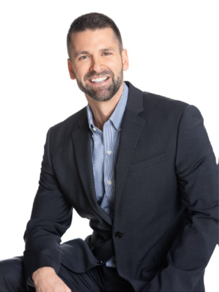 A bearded man in a suit