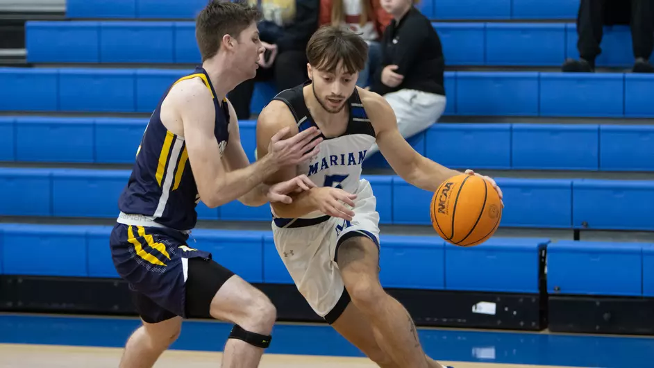 Men playing college basketball