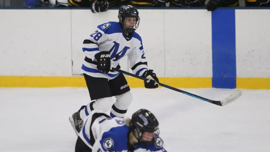 Women playing college hockey
