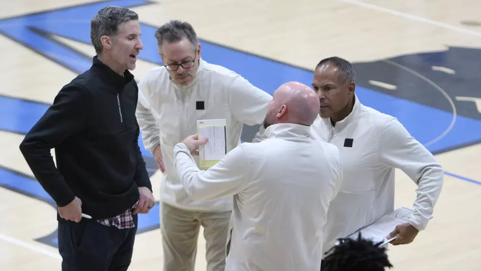 Coaches on the basketball court