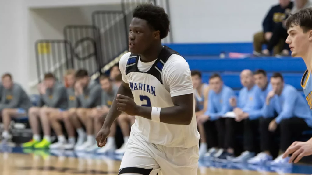 Men playing college basketball