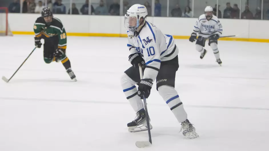 Men playing college hockey