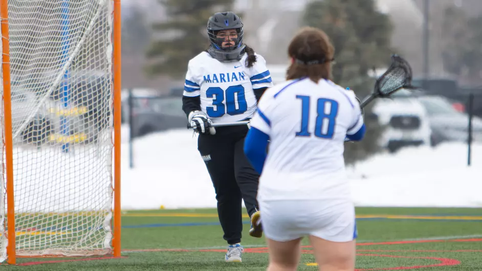 Women playing college lacrosse