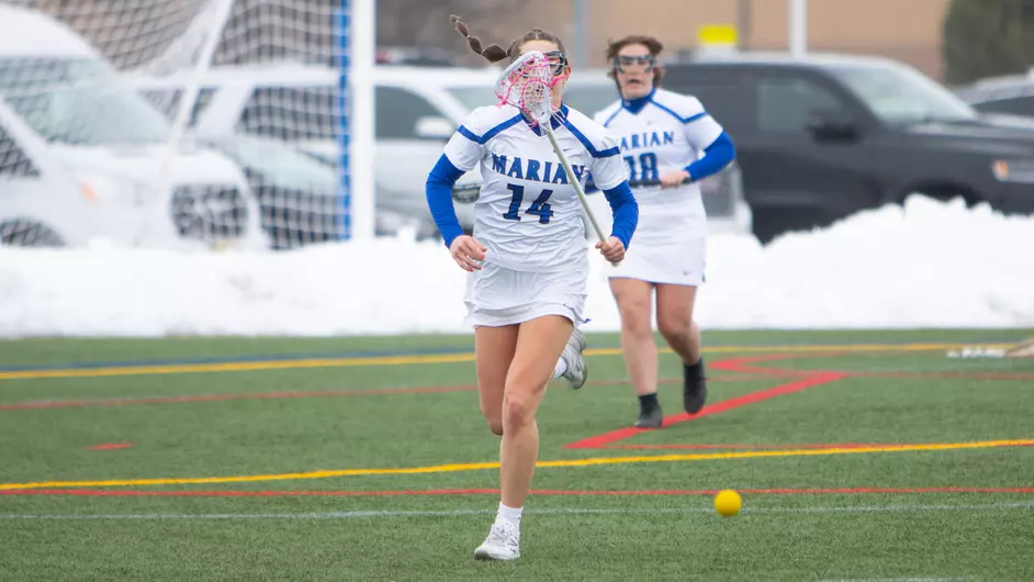 Women playing college lacrosse