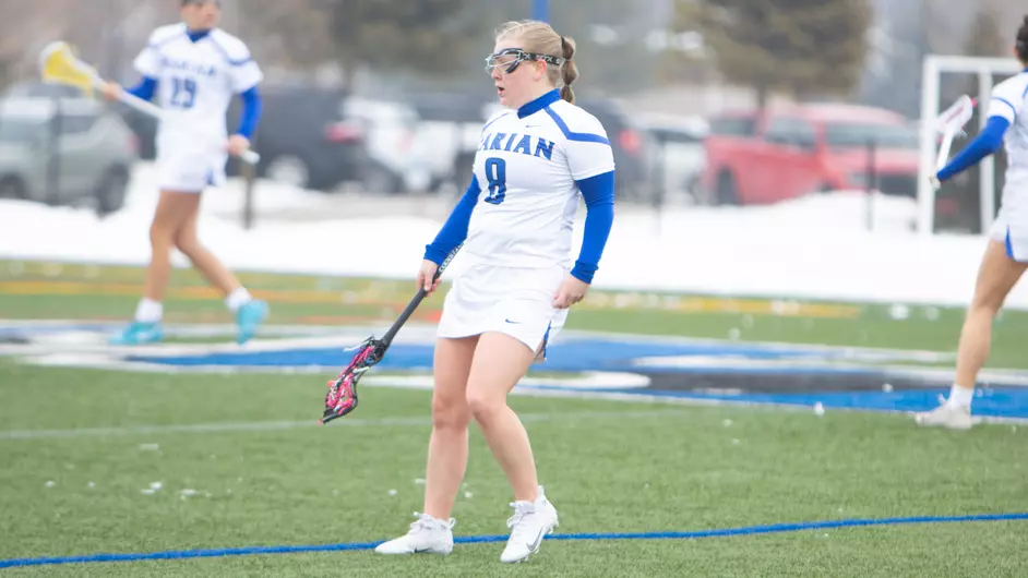Women playing college lacrosse