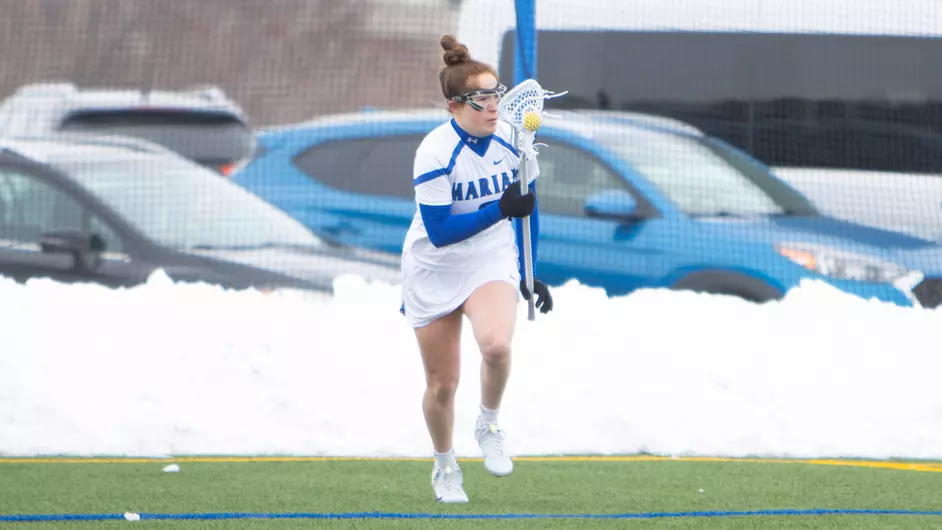 Women playing college lacrosse