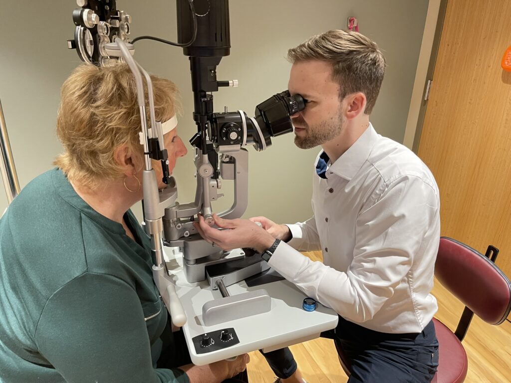 An eye doctor and a patient