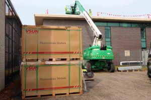 A crane lifting boxes