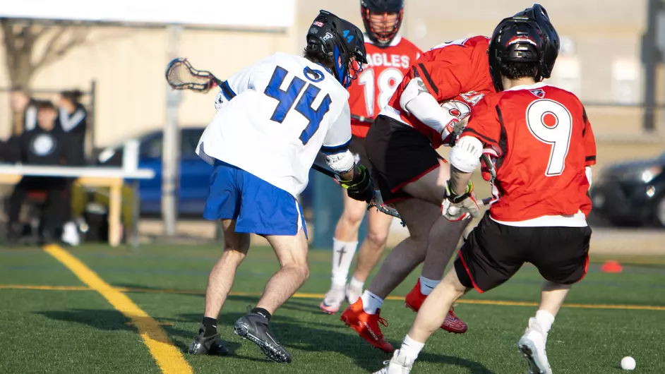 Men playing college lacrosse