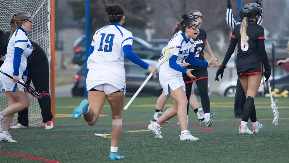 Women playing college lacrosse