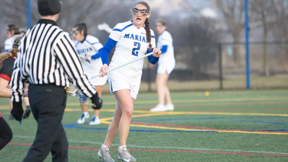 Women playing college lacrosse