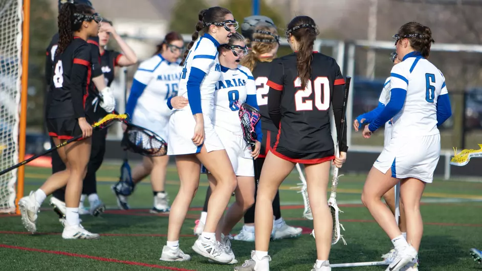Women playing college lacrosse