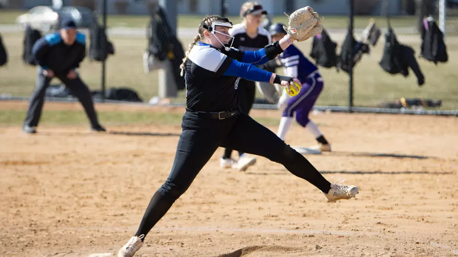 Women playing college softball