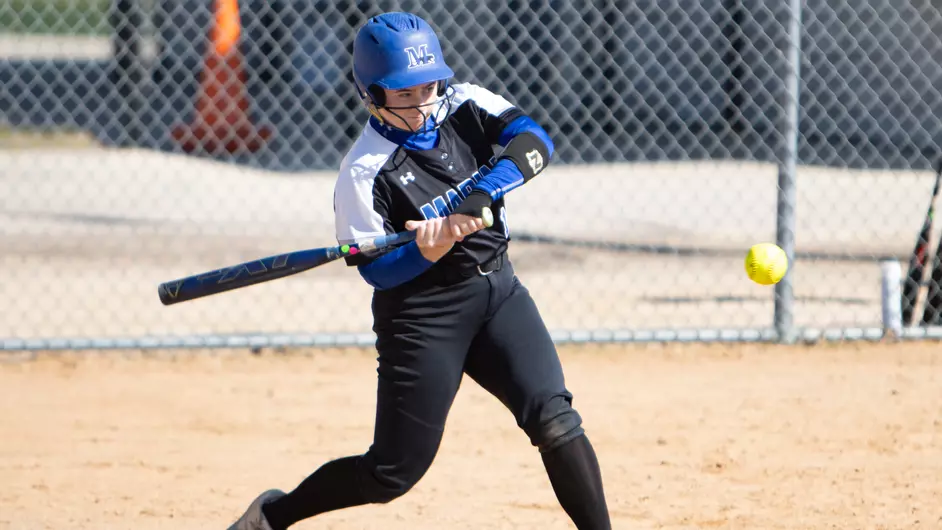 Women playing college softball