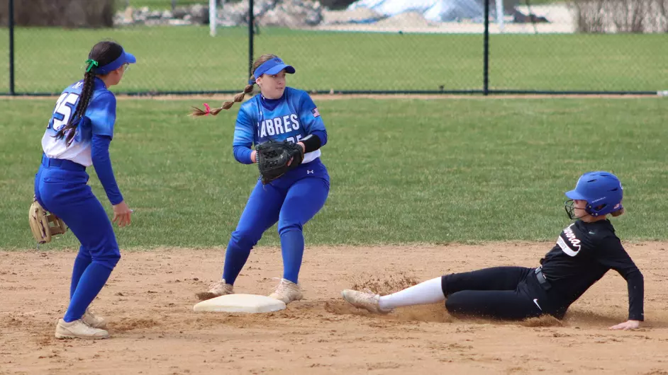 Women playing college softball