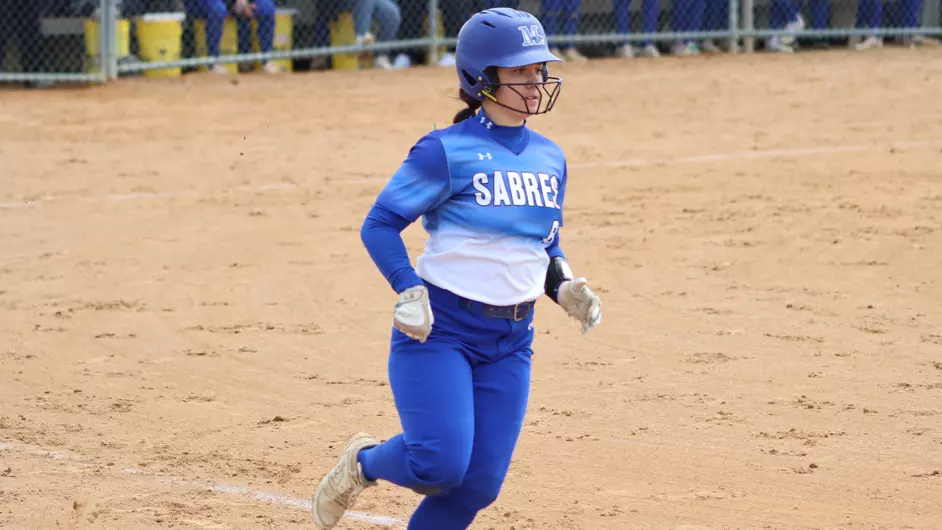 Women playing college softball