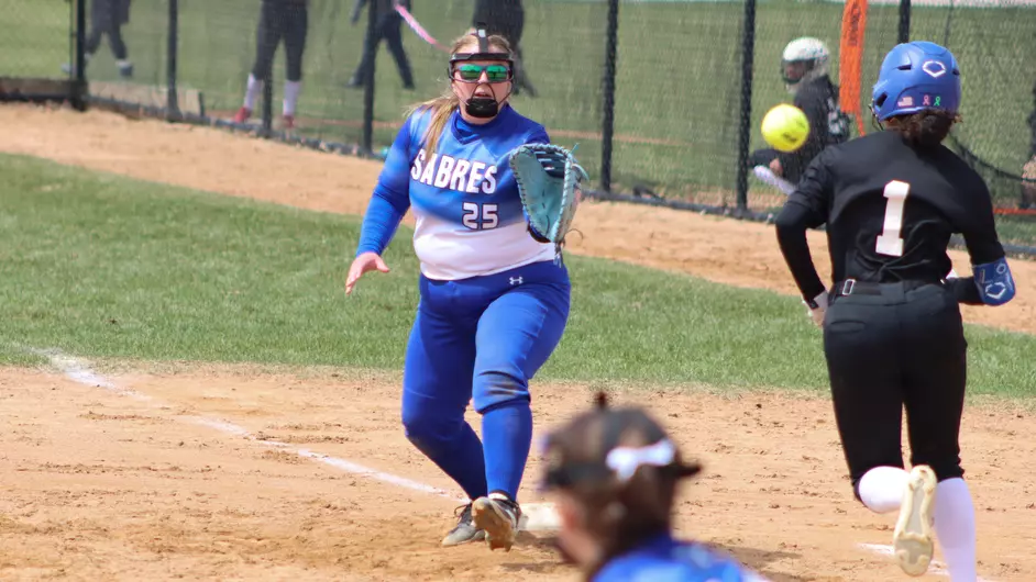Women playing college softball