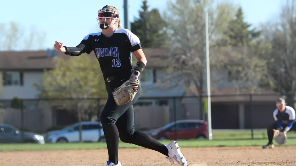 Women playing college softball