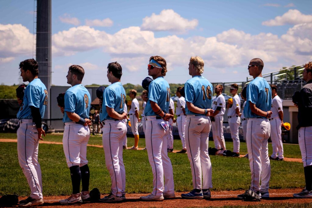 Six baseball players lined up