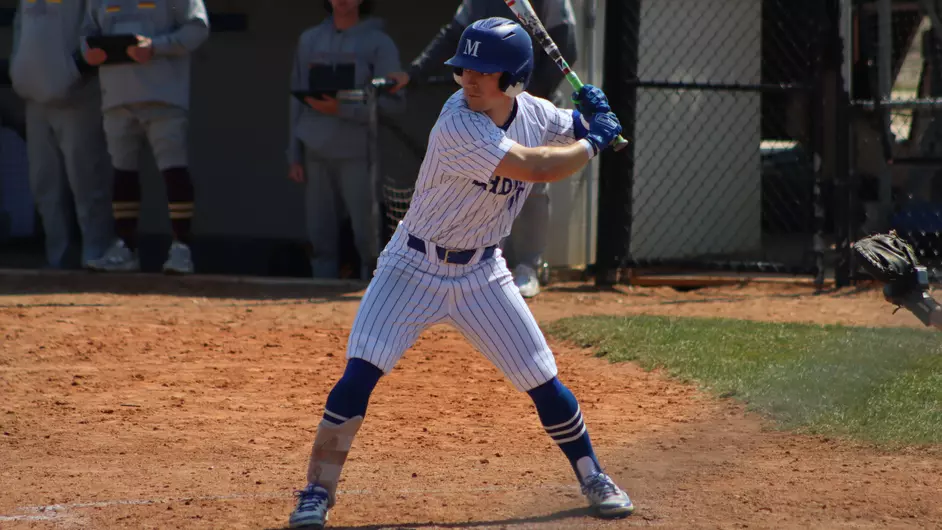A man batting for a college baseball team