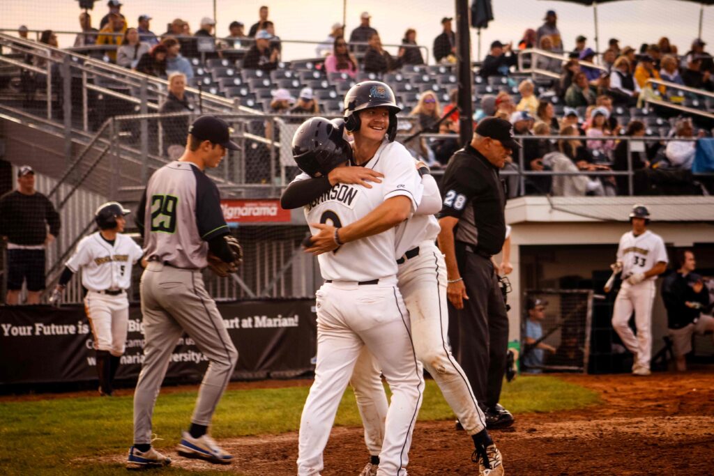 Two baseball players celebrating