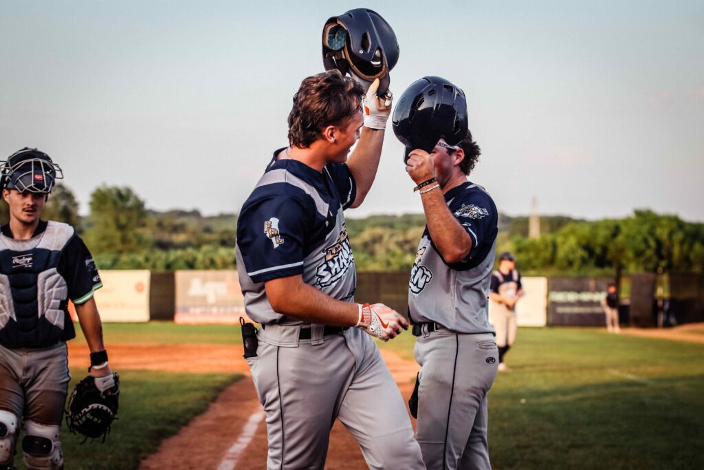 Two baseball players celebrating