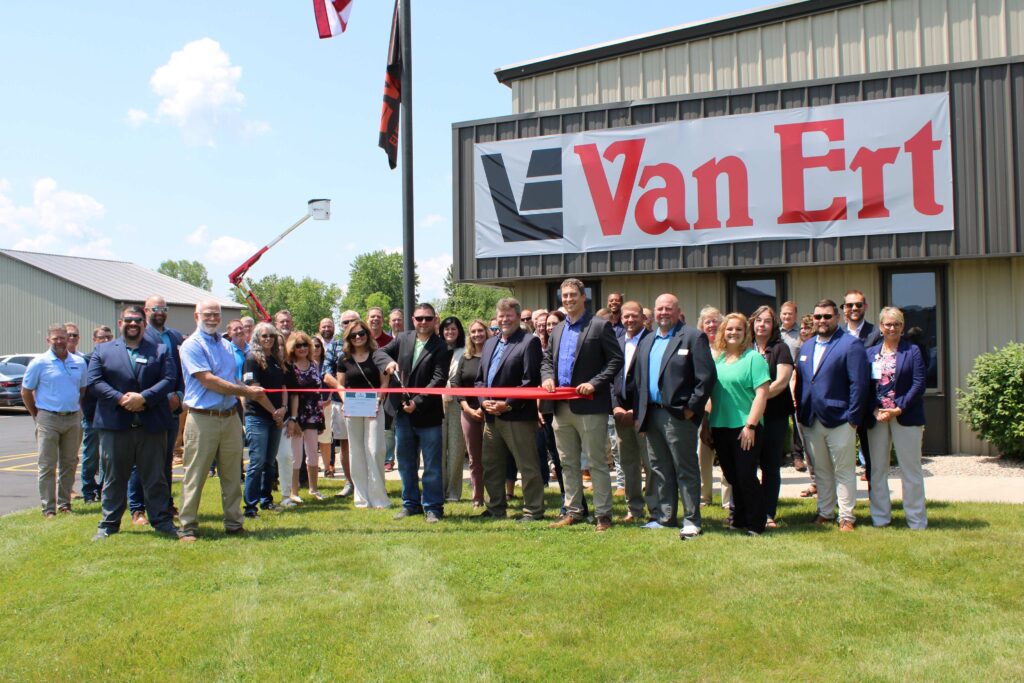 Large group outside for a ribbon cutting