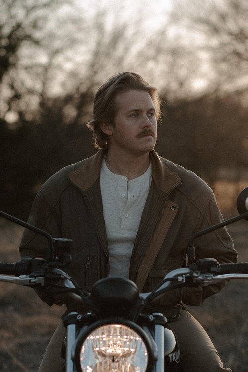 A man on a motorcycle