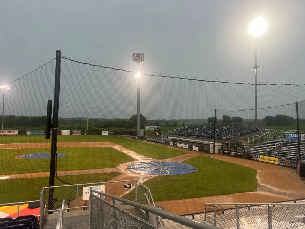Rain falling on a baseball field