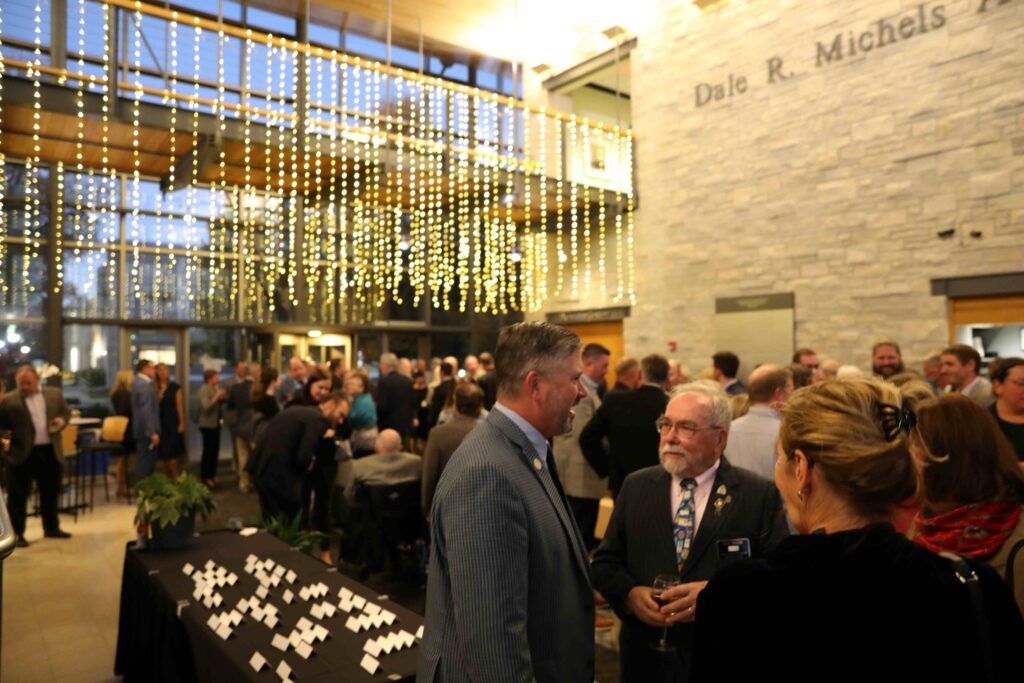 People standing in the lobby of a building