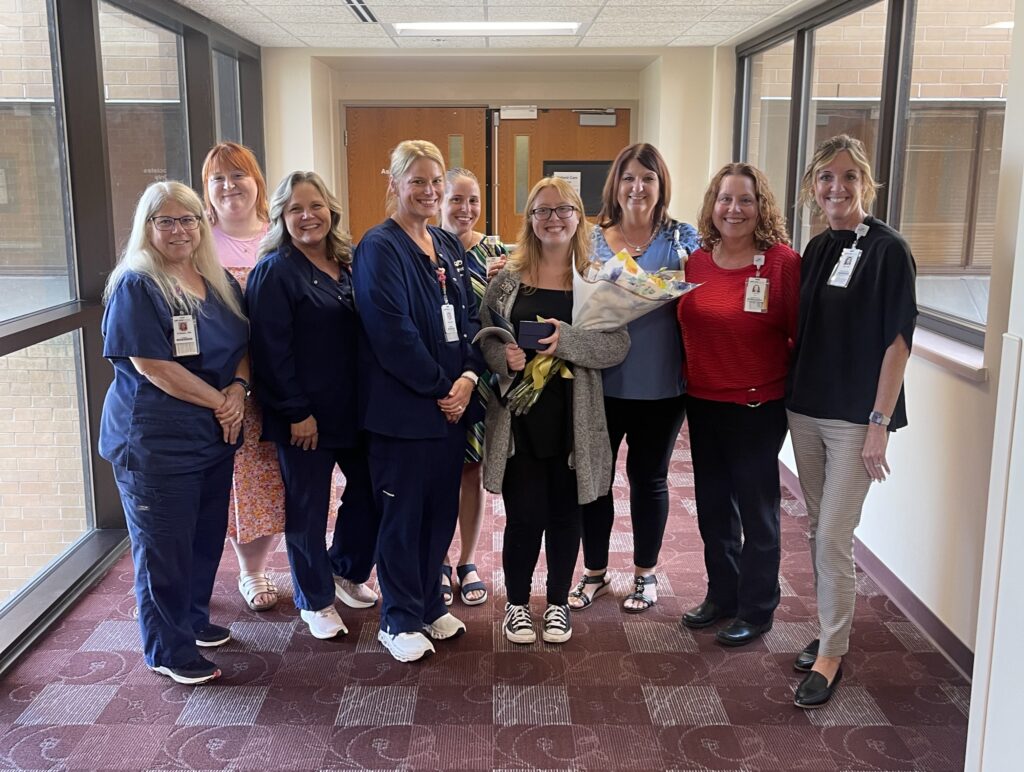 A group of woman in a hospital hallway