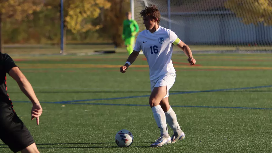 College men playing soccer