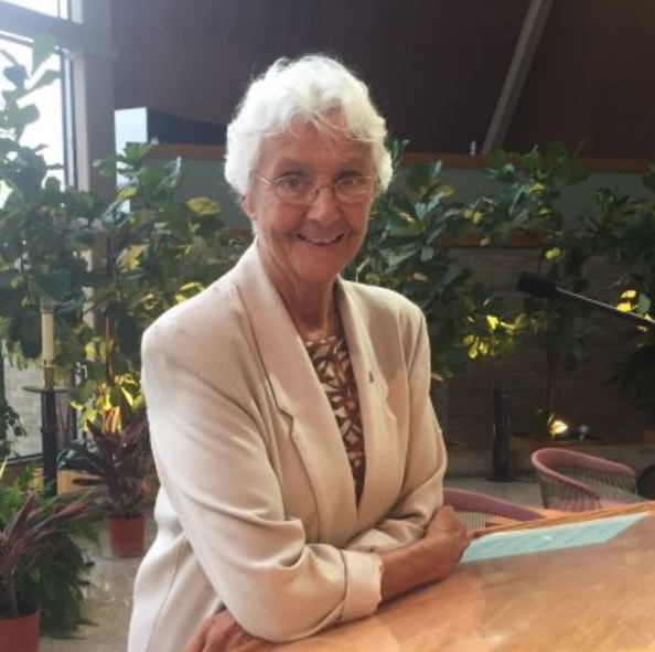 A smiling older woman.