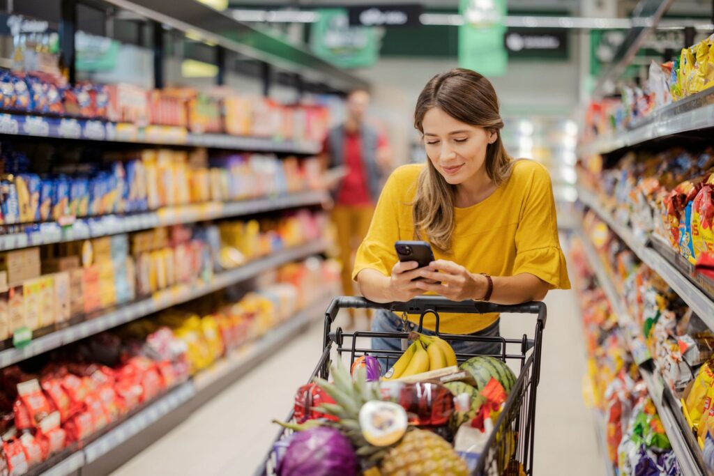 A woman grocery shopping
