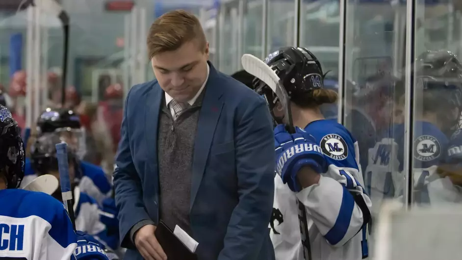 Men playing and coaching college hockey