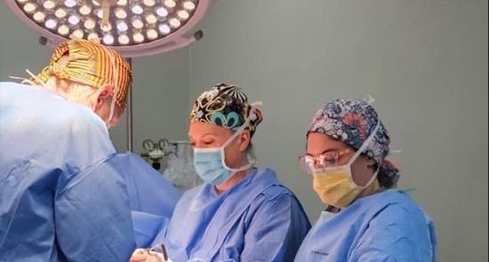 Doctors performing surgery