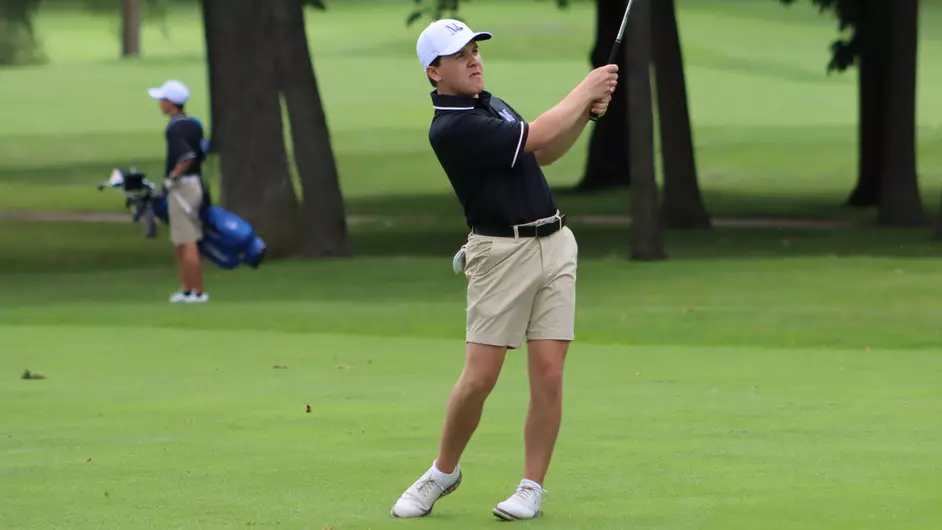 Men playing college golf