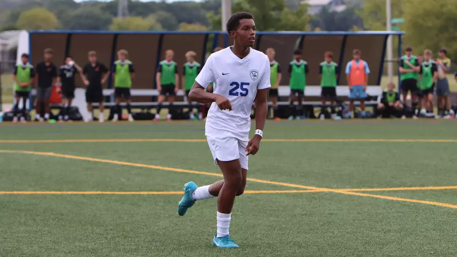 Men playing college soccer