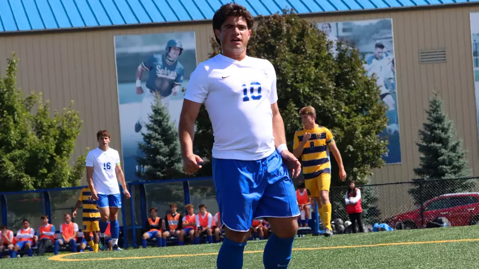 Men playing college soccer