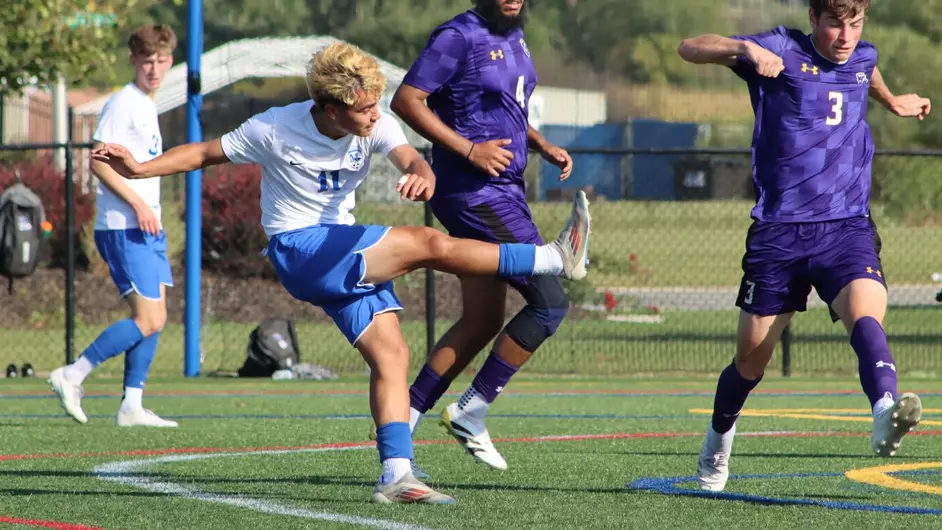 Men playing college soccer