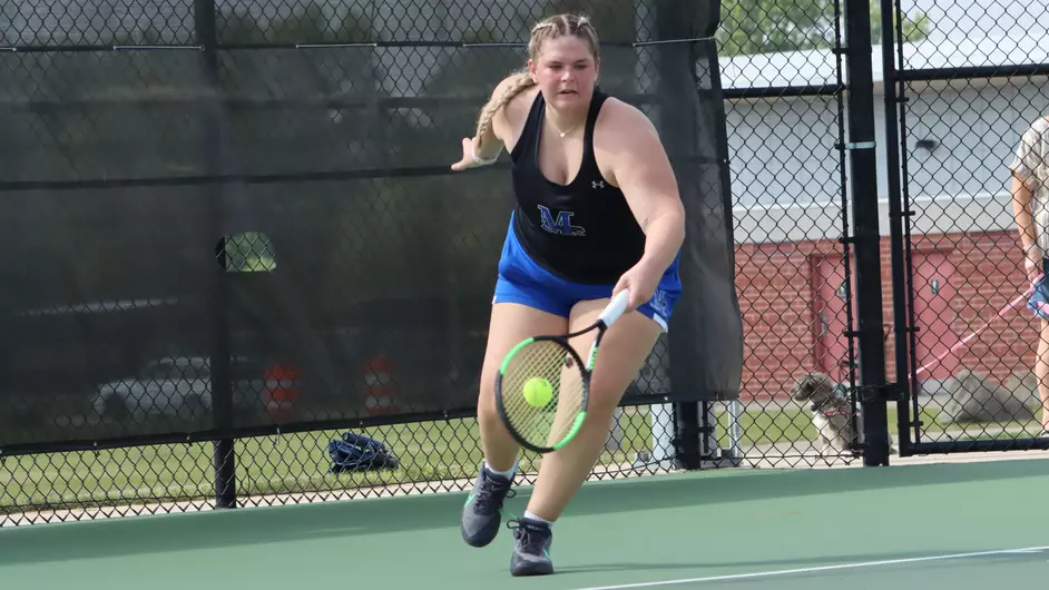 Women playing college tennis