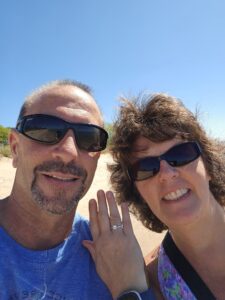 A man and a woman sharing her ring