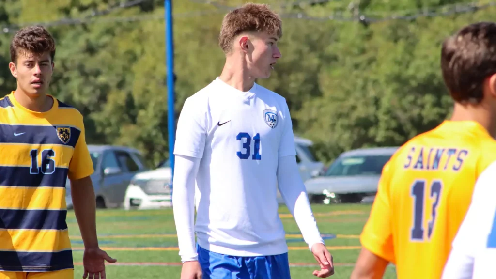 Men playing college soccer